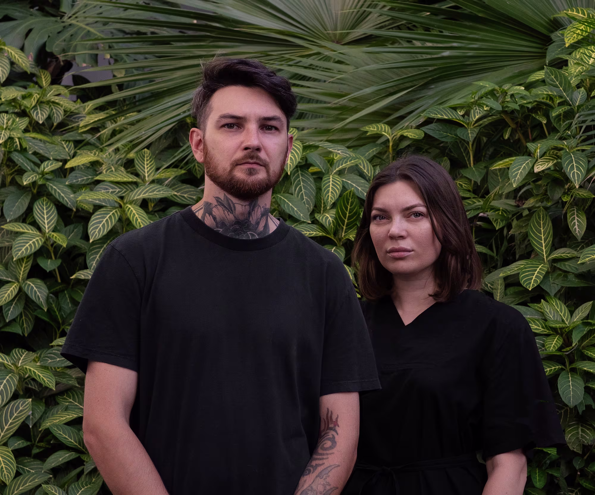 Portrait of Katerina Oleinikova and Denis Gomes — founders of Arrived Aliens.