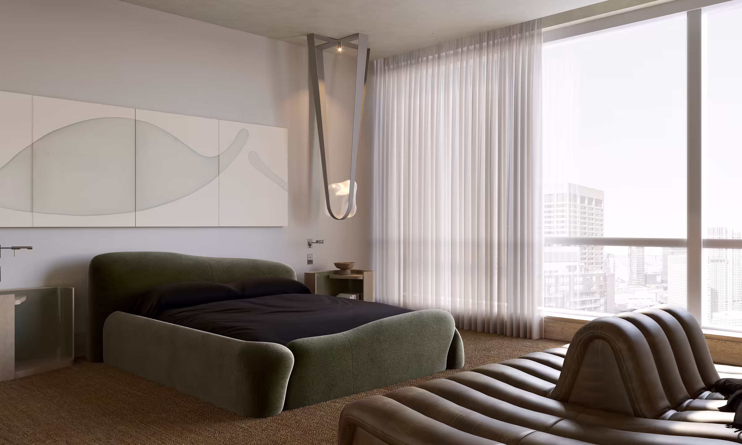 Minimalist bedroom with a sculptural green bed by Faina, black bedding, and a distinctive custom designed soft-edged ceiling light. Sheer curtains cover floor-to-ceiling windows, with a Boston skyline visible outside. A curved leather chaise by De Sede faces the bed.