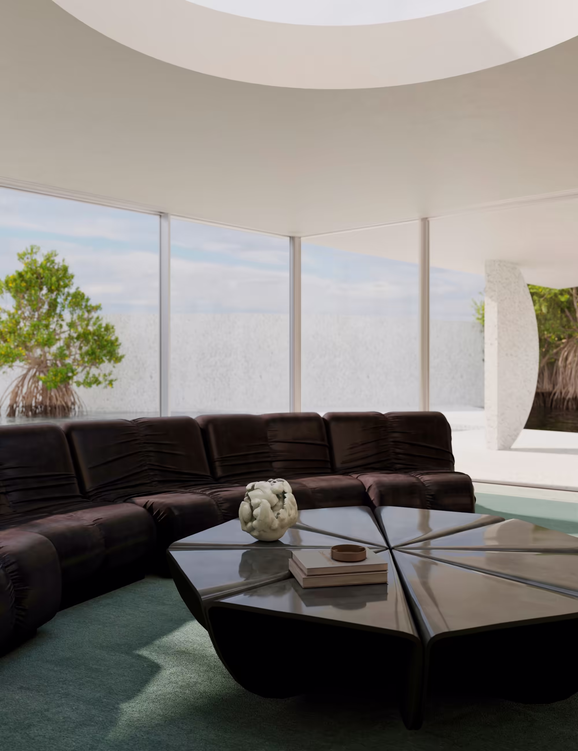 Alternate view of living room highlighting the Fen Sofa and custom ceramic coffee table inspired by seed pod geometry.